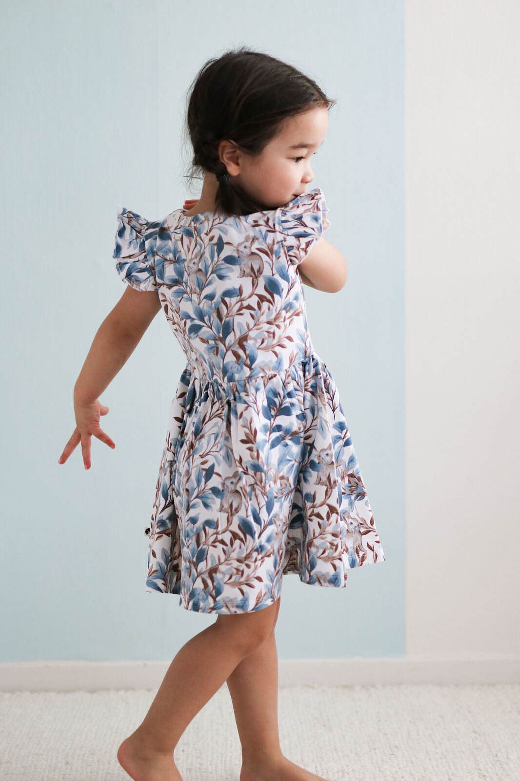 Eden Flutter Dress by Burrow and Be flat lay showing Eden print detail