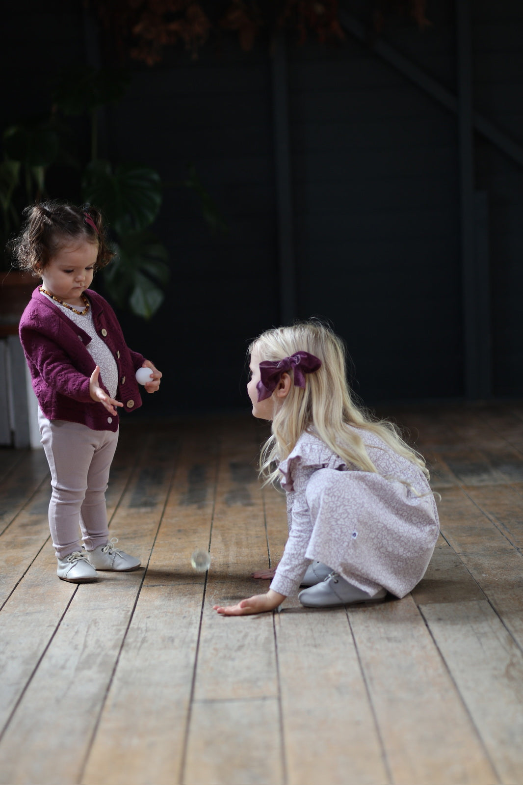 Two sisters in organic cotton, the younger wearing pieces kept from the elder, Burrow and Be Singapore