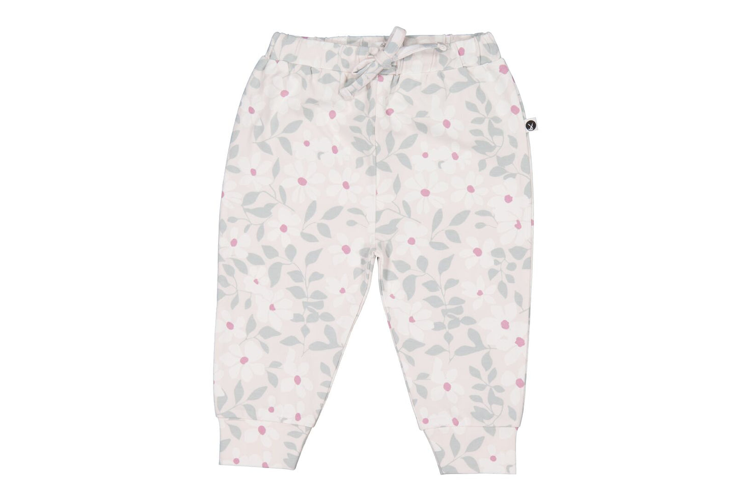 White pants with floral pattern on a white background
