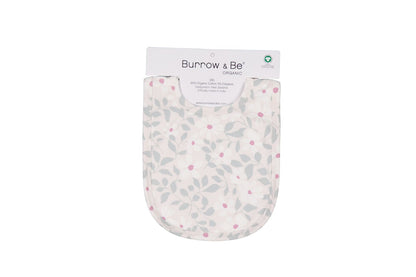 Baby bib with leaf pattern and 'Burrow & Be' branding on a white background