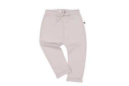 Light pink sweatpants on a white background