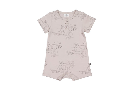 Baby romper with dinosaur pattern on a white background