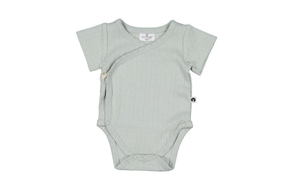 Light gray baby bodysuit on a white background