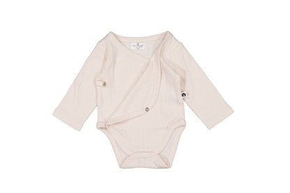 Beige baby bodysuit with long sleeves on a white background