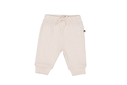 Beige baby pants with a small logo on a white background