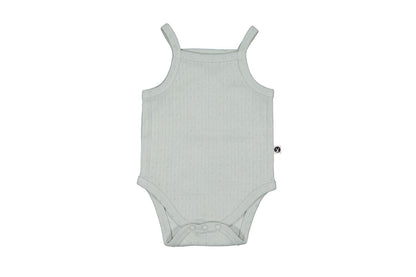 Gray baby romper with thin straps on a white background