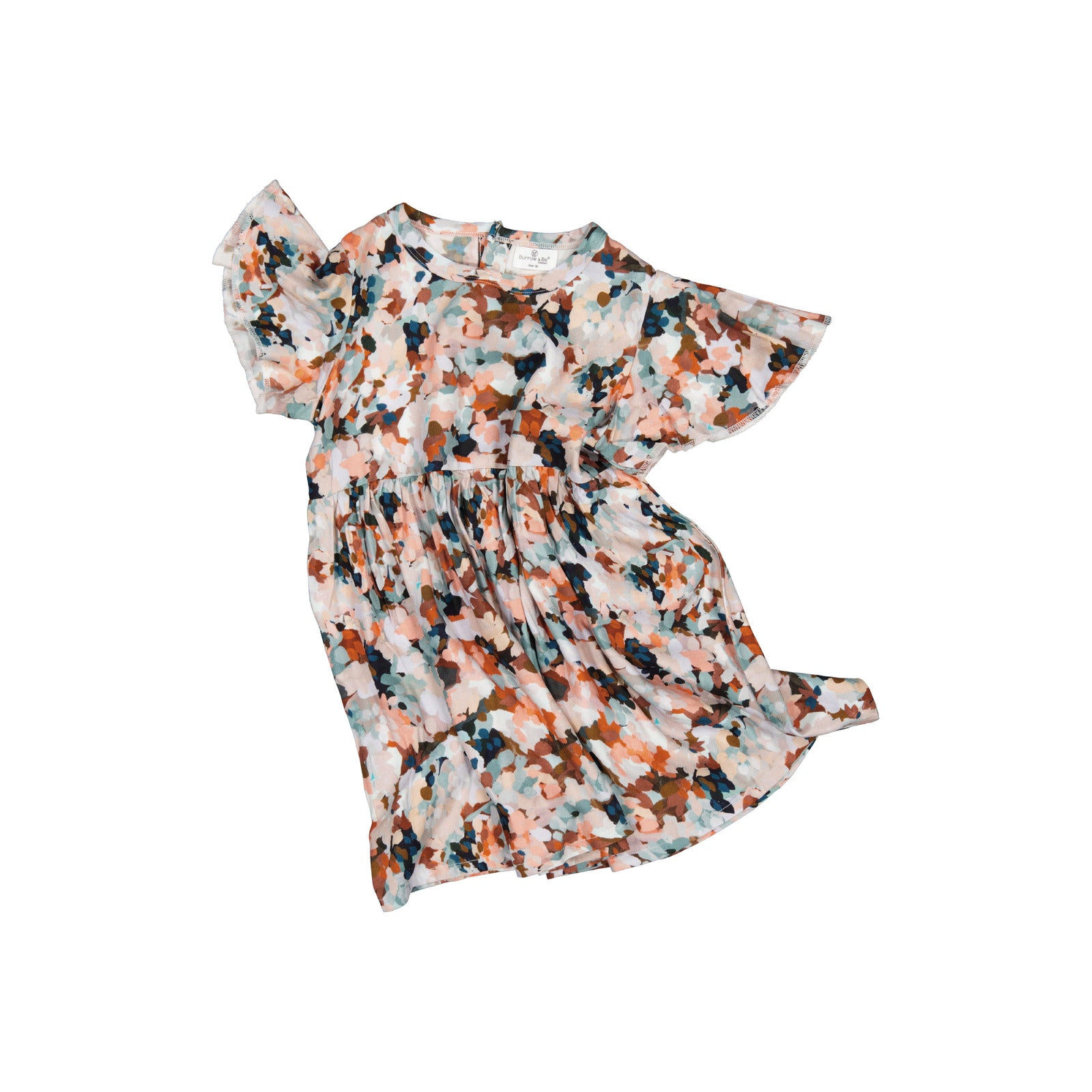 Delight Ella Dress by Burrow and Be showing the natural flow and softness of the material