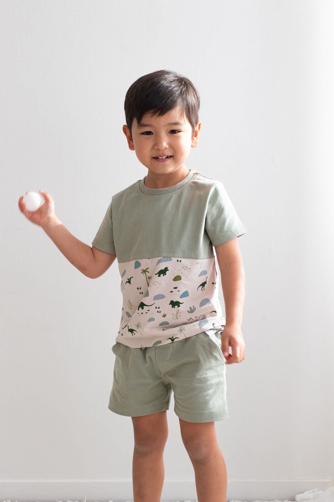 Boy wearing Seagrass Boys Shorts by Burrow and Be